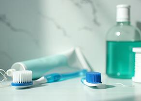 Oral hygiene instruments on bathroom countertop