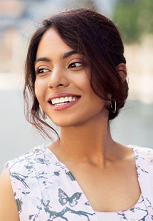 Woman standing outside and smiling